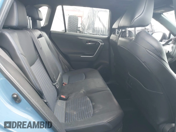 2023 Toyota RAV4 Hybrid XSE with VIN 2T3E6RFV4PW039496, listed as a IAAI auction lot 42488695 with 13,533 mi miles and . Bid and sale history available at DreamBid. Image 8.