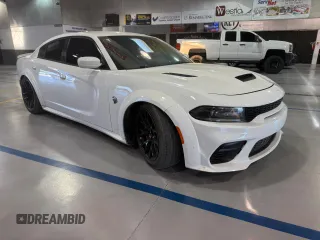 2021 Dodge Charger SRT Hellcat Widebody z VIN 2C3CDXL93MH662407, wystawiony jako Copart lot #58264615 z przebiegiem 56 012 mil mil oraz Czysty tytuł • Clean title. Historia ofert i sprzedaży dostępna na DreamBid. Obrazek 1.