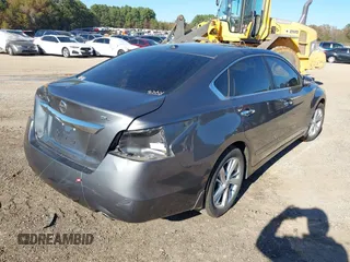 2015 Nissan Altima SL with VIN 1N4AL3AP0FN407679, listed as a IAAI auction lot 40909974 with 129,597 mi miles and . Bid and sale history available at carsss.com. Image 4.