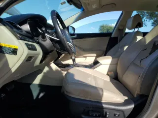 2014 Kia Cadenza Premium with VIN KNALN4D71E5137968, listed as a Copart auction lot 77713464 with 167,157 mi miles and Salvage Title. Bid and sale history available at carsss.com. Image 7.