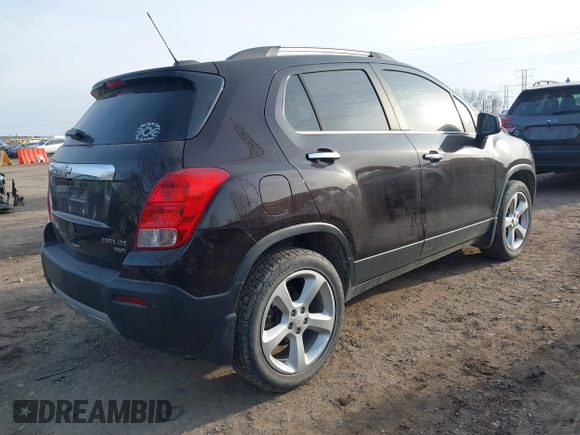 2015 Chevrolet Trax LTZ with VIN KL7CJTSB9FB101817, listed as a IAAI auction lot 41090727 with 108,959 mi miles. Bid and sale history available at carsss.com. Image 4.