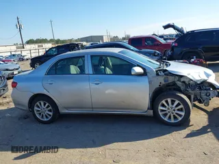 2009 Toyota Corolla with VIN JTDBL40E999021621, listed as a IAAI auction lot 41636462 with 123,650 mi miles. Bid and sale history available at carsss.com. Image 13.