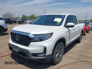 2023 Honda Ridgeline RTL z VIN 5FPYK3F51PB028295, wystawiony jako IAAI lot #42031783 z przebiegiem 39 228 mil mil oraz . Historia ofert i sprzedaży dostępna na DreamBid. Obrazek 6.