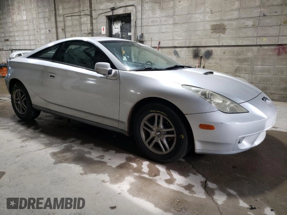 2000 Toyota Celica GT with VIN JTDDR32TXY0021398, listed as a Copart auction lot 82529474 with 271,041 mi miles and Salvage Title. Bid and sale history available at carsss.com. Image 4.