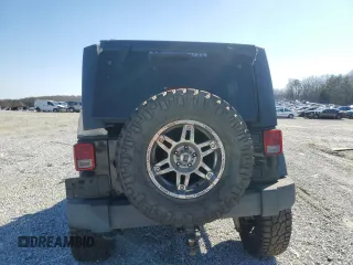 2014 Jeep Wrangler Unlimited Sport with VIN 1C4BJWDG9EL250326, listed as a Copart auction lot 48545705 with 247,460 mi miles and Salvage Title. Bid and sale history available at DreamBid. Image 6.