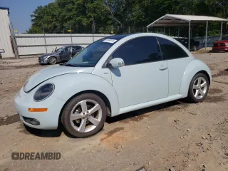 2010 Volkswagen Beetle with VIN 3VWRG3AG0AM027565, listed as a Copart auction lot 61908315 with 74,858 mi miles and Salvage title. Bid and sale history available at DreamBid. Image 1.
