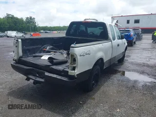 2004 Ford F-150 XL with VIN 2FTRX18W64CA04330, listed as a IAAI auction lot 42656922 with 165,327 mi miles and . Bid and sale history available at DreamBid. Image 4.