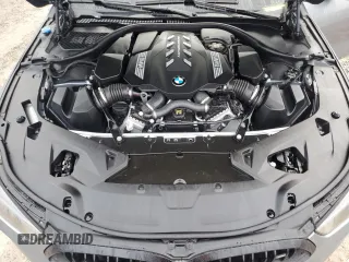 2023 BMW 8 Series M850i z VIN WBAGV8C02PCL20503, wystawiony jako Copart lot #84214214 z przebiegiem Nie podano mil oraz Szkoda całkowita • Salvage title. Historia ofert i sprzedaży dostępna na DreamBid. Obrazek 11.