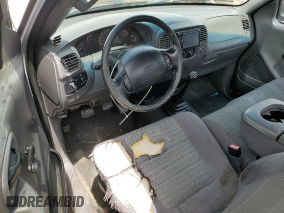 2002 Ford F-150 XL with VIN 1FTRF17242NB04340, listed as a Copart auction lot 58119345 with 218,734 mi miles and Non repairable. Bid and sale history available at DreamBid. Image 8.