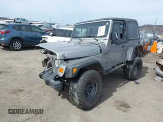2002 Jeep Wrangler X with VIN 1J4FA39S82P707610, listed as a IAAI auction lot 41709953 with 1 mi miles. Bid and sale history available at carsss.com. Image 2.