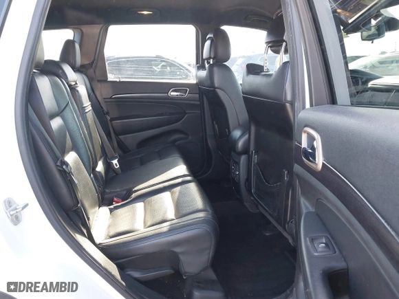 2014 Jeep Grand Cherokee Laredo with VIN 1C4RJEAGXEC130399, listed as a IAAI auction lot 41861664 with 106,925 mi miles. Bid and sale history available at carsss.com. Image 8.