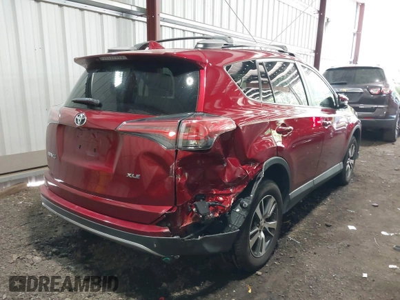 2018 Toyota RAV4 XLE with VIN 2T3WFREV7JW511624, listed as a IAAI auction lot 42618538 with 62,681 mi miles and . Bid and sale history available at DreamBid. Image 4.