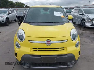 2014 FIAT 500L Trekking with VIN ZFBCFADH6EZ013536, listed as a IAAI auction lot 40313919 with 77,690 mi miles and . Bid and sale history available at DreamBid. Image 12.
