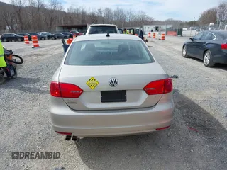2014 Volkswagen Jetta Sedan SE w/Connectivity with VIN 3VWD07AJ9EM248024, listed as a IAAI auction lot 41621186 with 130,886 mi miles. Bid and sale history available at carsss.com. Image 16.