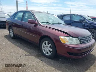 2003 Toyota Avalon XL z VIN 4T1BF28B53U306886, wystawiony jako IAAI lot #42289343 z przebiegiem 122 744 mil mil oraz . Historia ofert i sprzedaży dostępna na DreamBid. Obrazek 1.