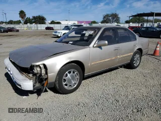 1992 Nissan Maxima z VIN JN1HJ01P6NT623546, wystawiony jako Copart lot #78095314 z przebiegiem 104 718 mil mil oraz Szkody całkowita. Historia ofert i sprzedaży dostępna na DreamBid. Obrazek 1.
