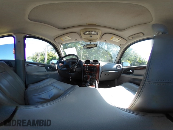 2005 GMC Envoy SLE with VIN 1GKDS13S452208252, listed as a IAAI auction lot 42357457 with 197,419 mi miles and . Bid and sale history available at DreamBid. Image 18.
