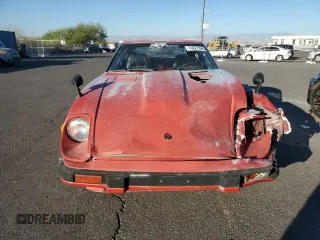 1983 Datsun 280ZX z VIN JN1HZ04S0DX569855, wystawiony jako Copart lot #74027594 z przebiegiem 12 300 mil mil oraz Szkody całkowita. Historia ofert i sprzedaży dostępna na DreamBid. Obrazek 5.