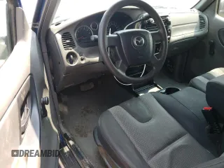2007 Mazda B-Series Truck z VIN 4F4YR12D07PM06609, wystawiony jako Copart lot #58994565 z przebiegiem 280 733 mil mil oraz Czysty tytuł • Clean title. Historia ofert i sprzedaży dostępna na DreamBid. Obrazek 8.