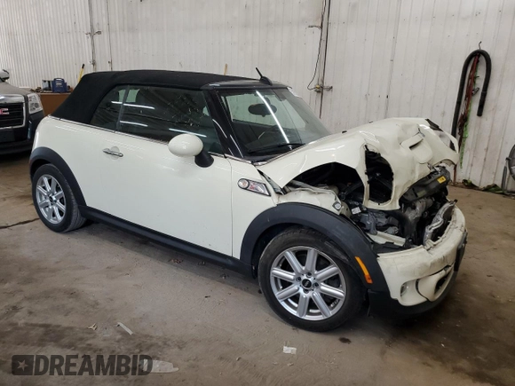 2015 MINI Convertible S с VIN WMWZP3C54F2A90956, выставлен на аукционе Copart как лот 57052545 с пробегом 39 096 миль миль и Списание • Salvage title. История ставок и продаж доступна на DreamBid. Изображение 4.