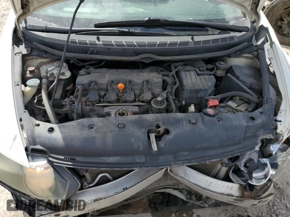 2010 Honda Civic LX with VIN 19XFA1F53AE061741, listed as a Copart auction lot 54627295 with 237,104 mi miles and Salvage Title. Bid and sale history available at DreamBid. Image 11.
