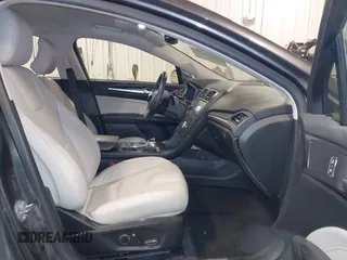 2018 Ford Fusion Hybrid Titanium with VIN 3FA6P0RU4JR147831, listed as a IAAI auction lot 41586033 with 101,088 mi miles. Bid and sale history available at carsss.com. Image 5.