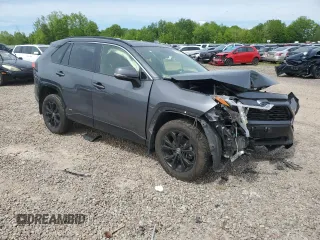 2023 Toyota RAV4 Hybrid SE with VIN JTM16RFVXPD088729, listed as a Copart auction lot 57879395 with 33,249 mi miles and Salvage title. Bid and sale history available at DreamBid. Image 4.