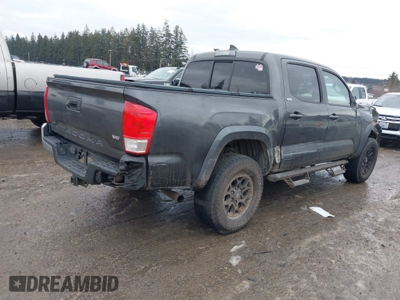 2017 Toyota Tacoma SR5 with VIN 3TMAZ5CN5HM038170, listed as a IAAI auction lot 41588399 with 152,469 mi miles. Bid and sale history available at carsss.com. Image 4.