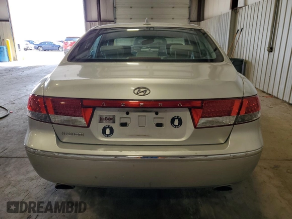 2010 Hyundai Azera GLS with VIN KMHFC4DD7AA473519, listed as a Copart auction lot 71422234 with 120,080 mi miles and Salvage title. Bid and sale history available at DreamBid. Image 6.