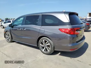 2023 Honda Odyssey Touring with VIN 5FNRL6H89PB053593, listed as a Copart auction lot 64836685 with 26,568 mi miles and Salvage title. Bid and sale history available at DreamBid. Image 2.