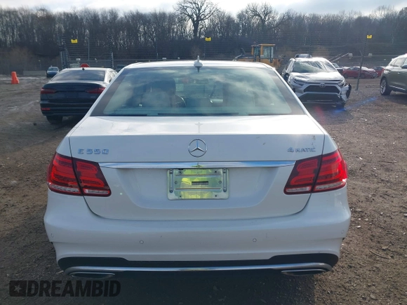 2014 Mercedes-Benz E 550 Sport with VIN WDDHF9BB5EA949457, listed as a IAAI auction lot 41128583 with 99,248 mi miles and . Bid and sale history available at DreamBid. Image 16.