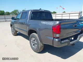 2018 Toyota Tacoma SR with VIN 5TFCZ5AN6JX127774, listed as a IAAI auction lot 41989635 with 28,161 mi miles. Bid and sale history available at carsss.com. Image 3.