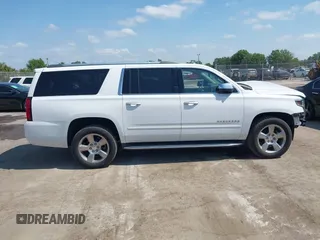 2020 Chevrolet Suburban Premier with VIN 1GNSCJKC9LR125292, listed as a IAAI auction lot 42073858 with 92,363 mi miles and . Bid and sale history available at DreamBid. Image 13.