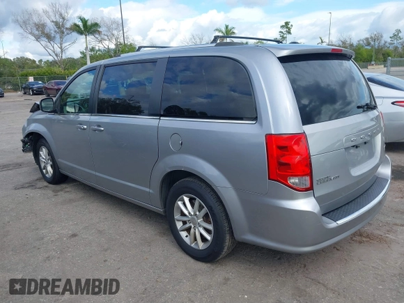 2018 Dodge Grand Caravan SXT z VIN 2C4RDGCG4JR179115, wystawiony jako IAAI lot #41163101 z przebiegiem 107 258 mil mil oraz . Historia ofert i sprzedaży dostępna na DreamBid. Obrazek 3.