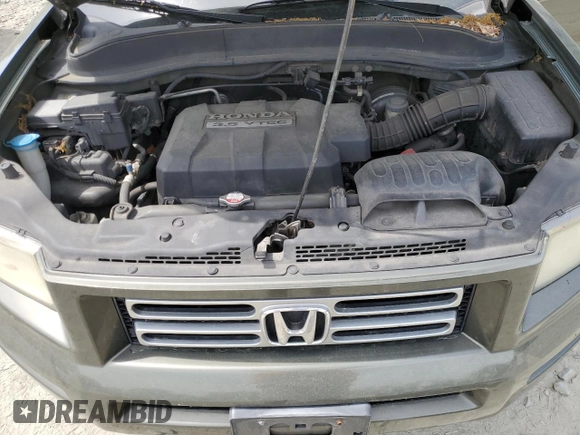 2006 Honda Ridgeline RTS z VIN 2HJYK16476H544699, wystawiony jako Copart lot #53528725 z przebiegiem 225 881 mil mil oraz Szkoda całkowita • Salvage title. Historia ofert i sprzedaży dostępna na DreamBid. Obrazek 11.