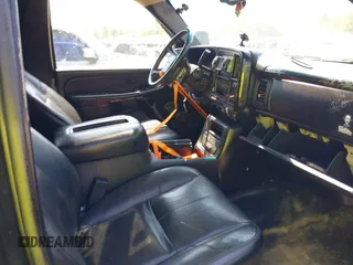 2002 GMC Yukon SLT with VIN 1GKEK13Z22R224227, listed as a IAAI auction lot 42079459 with 249,754 mi miles. Bid and sale history available at carsss.com. Image 5.