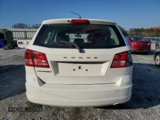 2014 Dodge Journey American Value Pkg with VIN 3C4PDCAB5ET133965, listed as a Copart auction lot 48279275 with 145,772 mi miles and Salvage Title. Bid and sale history available at carsss.com. Image 6.