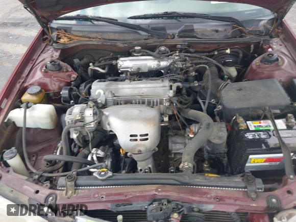2000 Toyota Camry CE z VIN JT2BG22K3Y0521541, wystawiony jako IAAI lot #42074772 z przebiegiem 144 587 mil mil oraz . Historia ofert i sprzedaży dostępna na DreamBid. Obrazek 10.