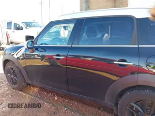 2015 MINI Countryman with VIN WMWZB3C59FWR44862, listed as a IAAI auction lot 41199254 with 94,074 mi miles and . Bid and sale history available at DreamBid. Image 14.