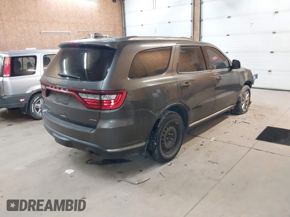 2017 Dodge Durango SXT with VIN 1C4RDJAG7HC606497, listed as a IAAI auction lot 41557479 with 140,151 mi miles and . Bid and sale history available at DreamBid. Image 4.
