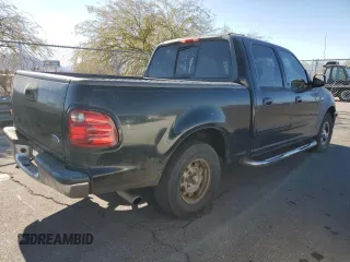 2002 Ford F-150 XLT with VIN 1FTRW07682KB94008, listed as a Copart auction lot 88724185 with 231,464 mi miles and Salvage Title. Bid and sale history available at carsss.com. Image 3.