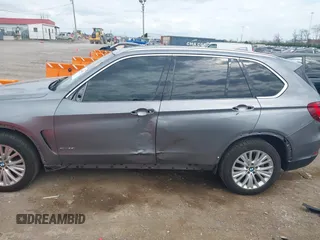 2016 BMW X5 xDrive35i z VIN 5UXKR0C53G0P19015, wystawiony jako IAAI lot #41930862 z przebiegiem 150 762 mil mil oraz . Historia ofert i sprzedaży dostępna na DreamBid. Obrazek 15.
