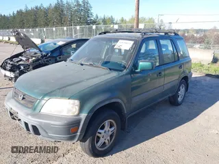 2001 Honda CR-V EX with VIN JHLRD18661C000677, listed as a IAAI auction lot 42020034 with 133,192 mi miles. Bid and sale history available at carsss.com. Image 2.