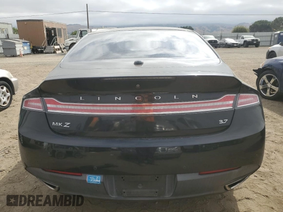 2014 Lincoln MKZ with VIN 3LN6L2GK8ER827980, listed as a Copart auction lot 58739125 with 69,359 mi miles and Salvage title. Bid and sale history available at DreamBid. Image 6.