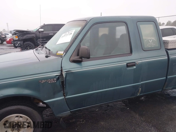 1997 Ford Ranger XLT with VIN 1FTCR14X3VPB26481, listed as a IAAI auction lot 41573728 with 209,256 mi miles. Bid and sale history available at carsss.com. Image 6.