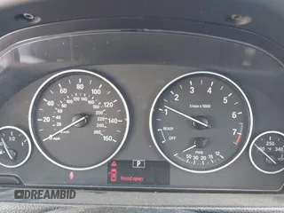 2014 BMW 3 Series 328i with VIN WBA3C1C50EK107365, listed as a IAAI auction lot 41959537 with 161,749 mi miles. Bid and sale history available at carsss.com. Image 7.