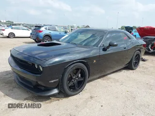 2016 Dodge Challenger R/T Scat Pack z VIN 2C3CDZFJ3GH334930, wystawiony jako IAAI lot #41872373 z przebiegiem 146 937 mil mil oraz . Historia ofert i sprzedaży dostępna na DreamBid. Obrazek 18.