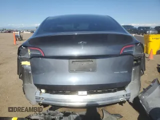 2023 Tesla Model Y Long Range z VIN 7SAYGDEE7PF965446, wystawiony jako Copart lot #54710375 z przebiegiem 23 807 mil mil oraz Szkoda całkowita • Salvage title. Historia ofert i sprzedaży dostępna na DreamBid. Obrazek 6.
