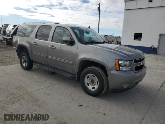 2012 Chevrolet Suburban LS with VIN 1GNWKLEG3CR308413, listed as a Copart auction lot 83671324 with 141,053 mi miles and Salvage title. Bid and sale history available at DreamBid. Image 4.