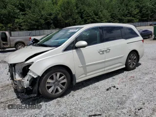 2014 Honda Odyssey Touring with VIN 5FNRL5H94EB065019, listed as a Copart auction lot 61059435 with 219,995 mi miles and Salvage title. Bid and sale history available at DreamBid. Image 1.